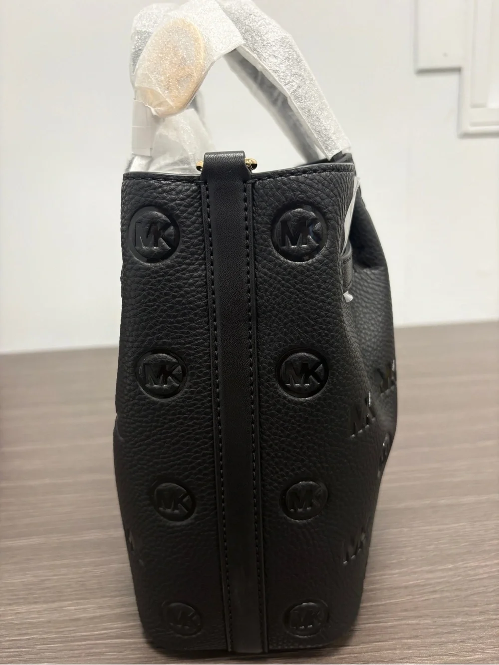 Michael Kors Carson Medium Debossed Satchel.